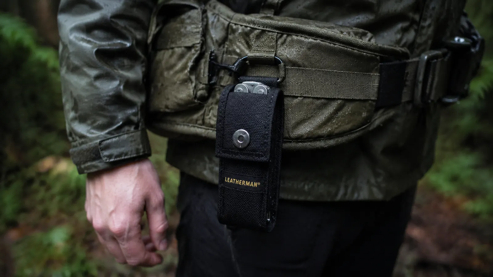 Leatherman Wave+ clipped to a pack hip belt on a rainy Washington state trail